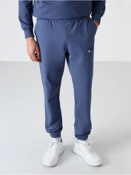 Conjunto de sudadera y pantalón oversize cuello redondo tommy - Kiabi Conjunto de sudadera y pantalón oversize cuello redondo tommy - Kiabi