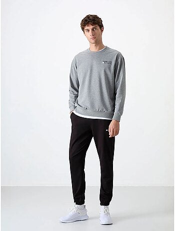Conjunto de sudadera y pantalón oversize cuello redondo tommy