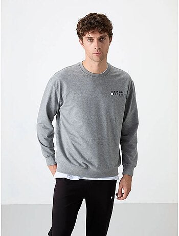 Conjunto de sudadera y pantalón oversize cuello redondo tommy