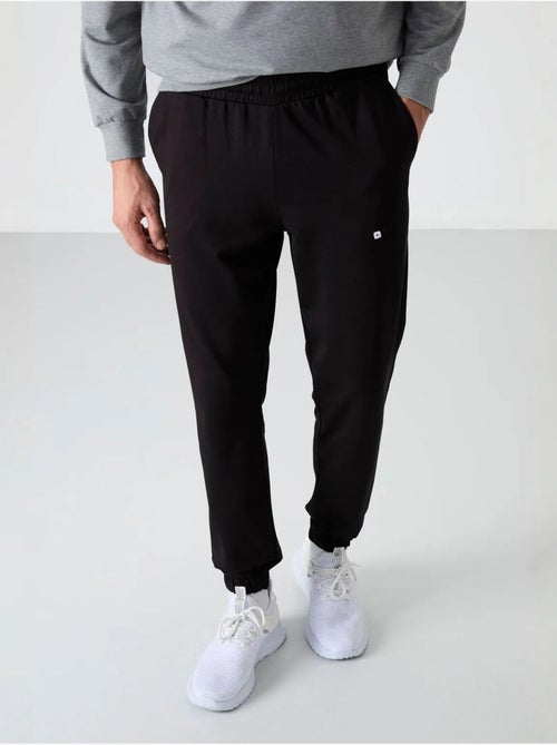 Conjunto de sudadera y pantalón oversize cuello redondo tommy - Kiabi Conjunto de sudadera y pantalón oversize cuello redondo tommy - Kiabi