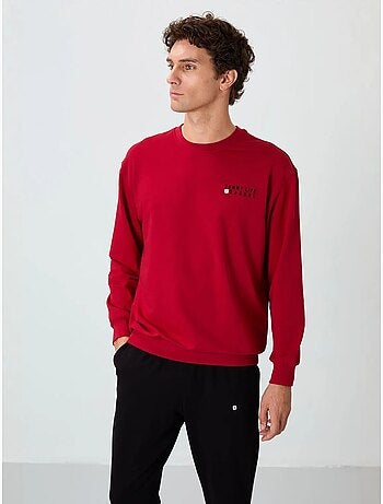 Conjunto de sudadera y pantalón oversize cuello redondo tommy