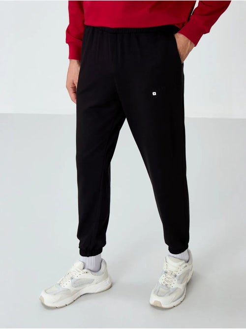 Conjunto de sudadera y pantalón oversize cuello redondo tommy - Kiabi Conjunto de sudadera y pantalón oversize cuello redondo tommy - Kiabi