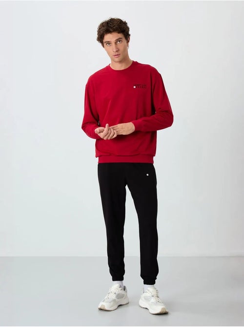 Conjunto de sudadera y pantalón oversize cuello redondo tommy - Kiabi Conjunto de sudadera y pantalón oversize cuello redondo tommy - Kiabi