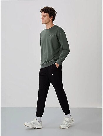 Conjunto de sudadera y pantalón oversize cuello redondo tommy