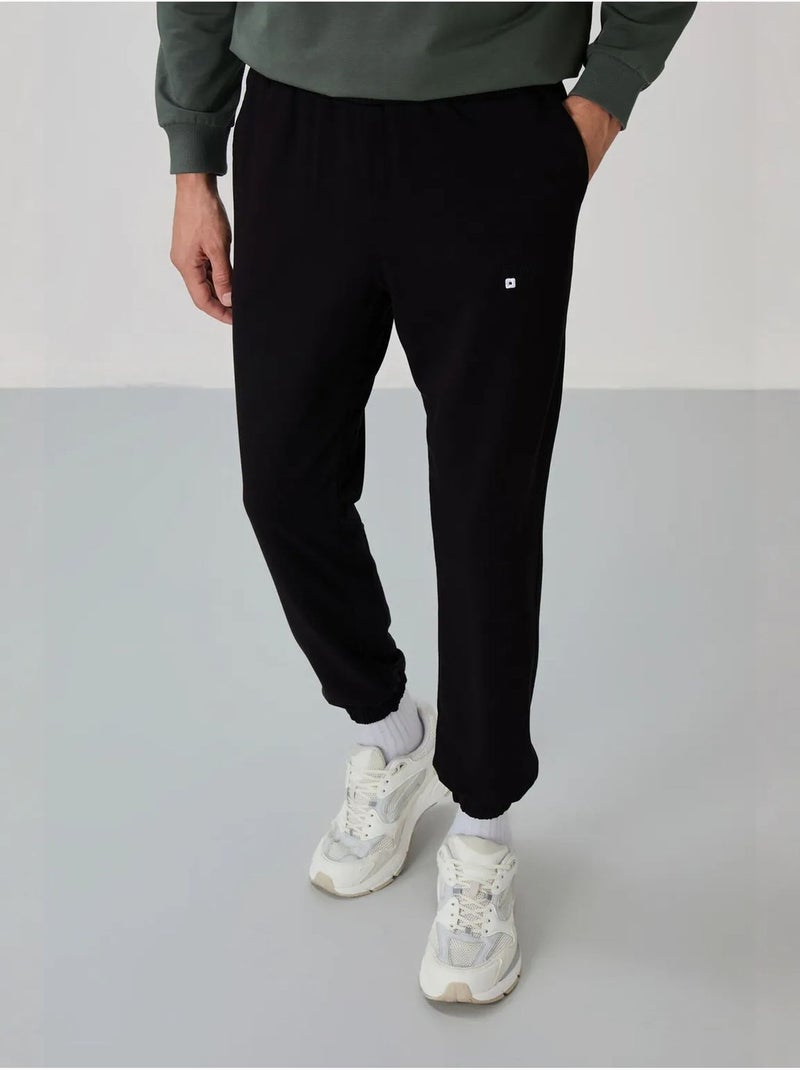 Conjunto de sudadera y pantalón oversize cuello redondo tommy Verde oscuro - Kiabi