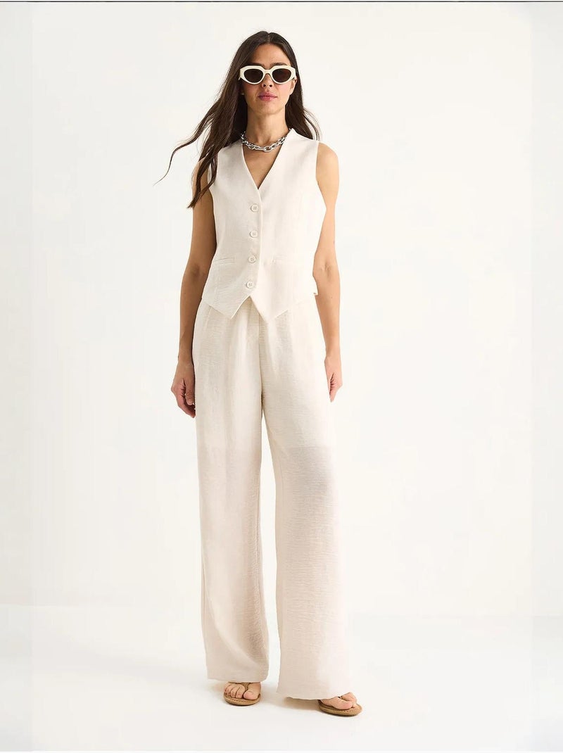 Conjunto de tres piezas con pantalón de cintura alta, chaleco y forro lucci Crema - Kiabi