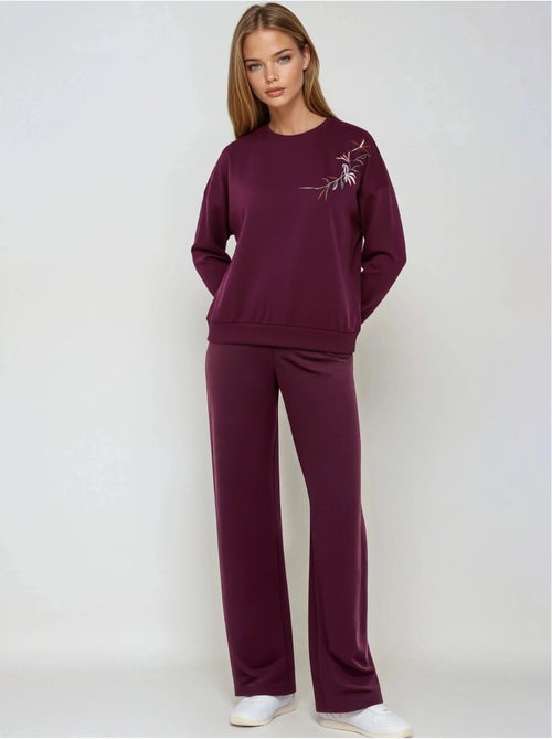 Conjunto largo de dos piezas con cuello redondo bordado y pantalones de pierna ancha hiccup - Kiabi Conjunto largo de dos piezas con cuello redondo bordado y pantalones de pierna ancha hiccup - Kiabi