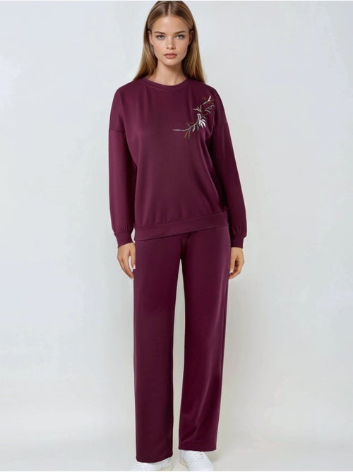 Conjunto largo de dos piezas con cuello redondo bordado y pantalones de pierna ancha hiccup - Kiabi Conjunto largo de dos piezas con cuello redondo bordado y pantalones de pierna ancha hiccup - Kiabi