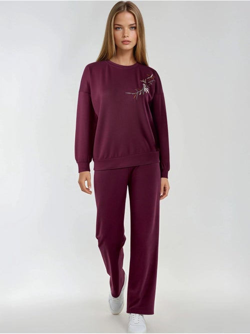 Conjunto largo de dos piezas con cuello redondo bordado y pantalones de pierna ancha hiccup - Kiabi Conjunto largo de dos piezas con cuello redondo bordado y pantalones de pierna ancha hiccup - Kiabi