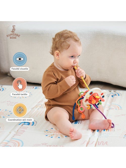 Cordones para tirar - Juguete de estimulación | SUPERBE BEBE - Kiabi Cordones para tirar - Juguete de estimulación | SUPERBE BEBE - Kiabi