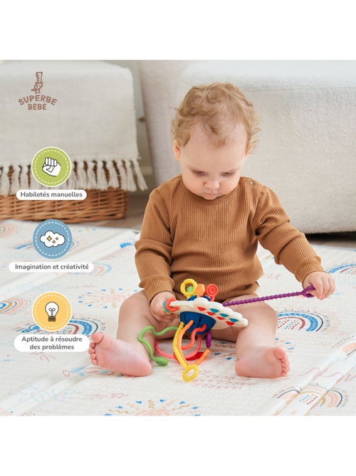 Cordones para tirar - Juguete de estimulación | SUPERBE BEBE - Kiabi Cordones para tirar - Juguete de estimulación | SUPERBE BEBE - Kiabi