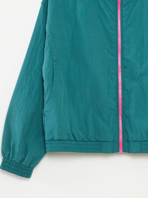 Cortavientos con capucha y bajo elástico - Kiabi