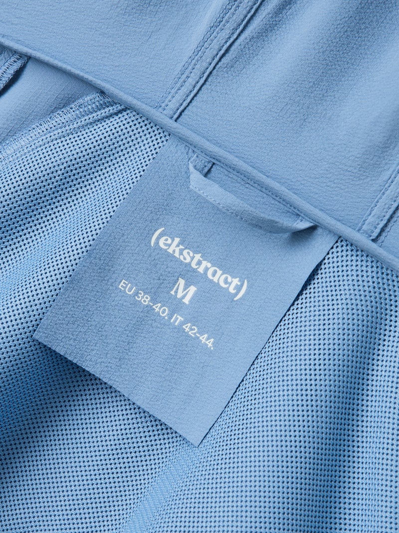 Cortavientos deportivo con capucha Azul - Kiabi