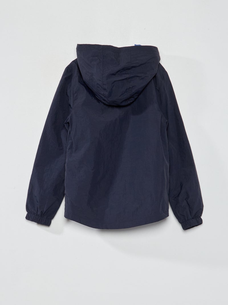 Cortavientos impermeable con capucha azul - Kiabi
