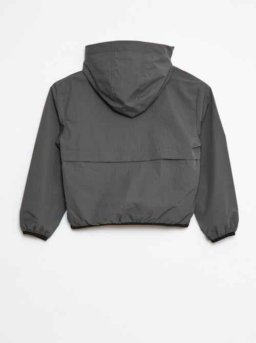 Cortavientos impermeable con capucha - Kiabi
