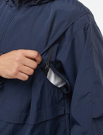 Cortavientos impermeable con capucha mangas extraíbles