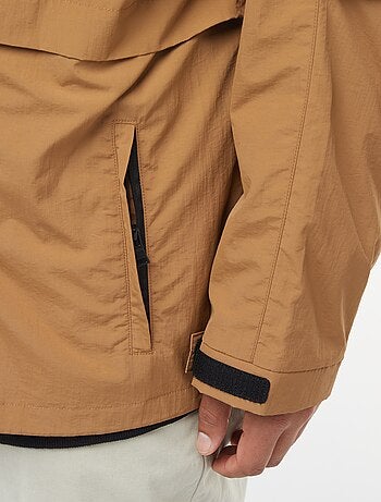 Cortavientos impermeable con capucha mangas extraíbles