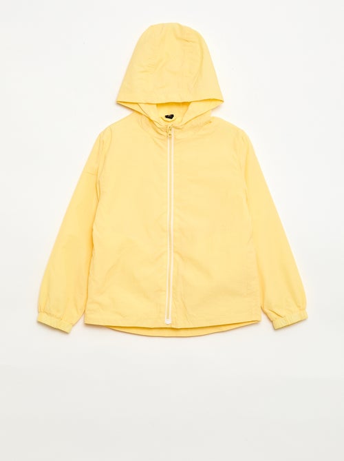 Cortavientos liso que se guarda en su capucha - Kiabi