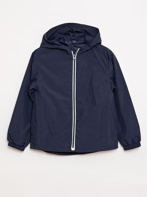 Cortavientos liso que se guarda en su capucha - Kiabi