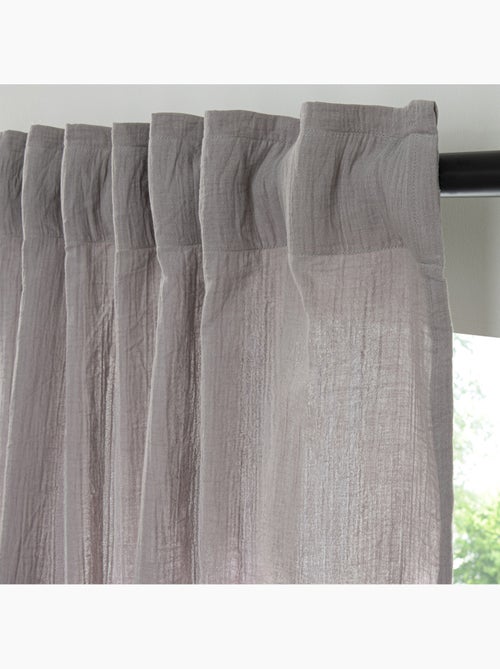 Cortina de gasa de algodón con presillas ocultas por unidad 140x260cm - Kiabi Cortina de gasa de algodón con presillas ocultas por unidad 140x260cm - Kiabi