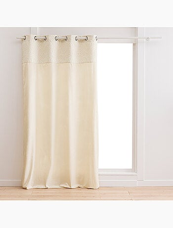 Cortina difusora de terciopelo con ojales y cenefa de jacquard con estampado de cebra