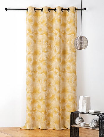 Cortina jacquard con motivo de sol y ojales
