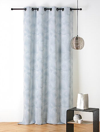 Cortina jacquard con motivo de sol y ojales