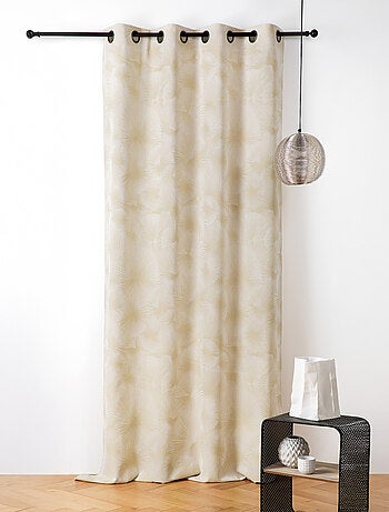 Cortina jacquard con motivo de sol y ojales