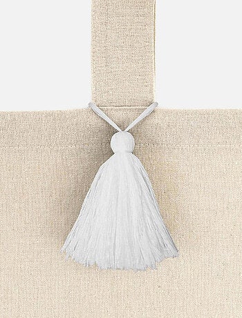 Cortina natural con pompones