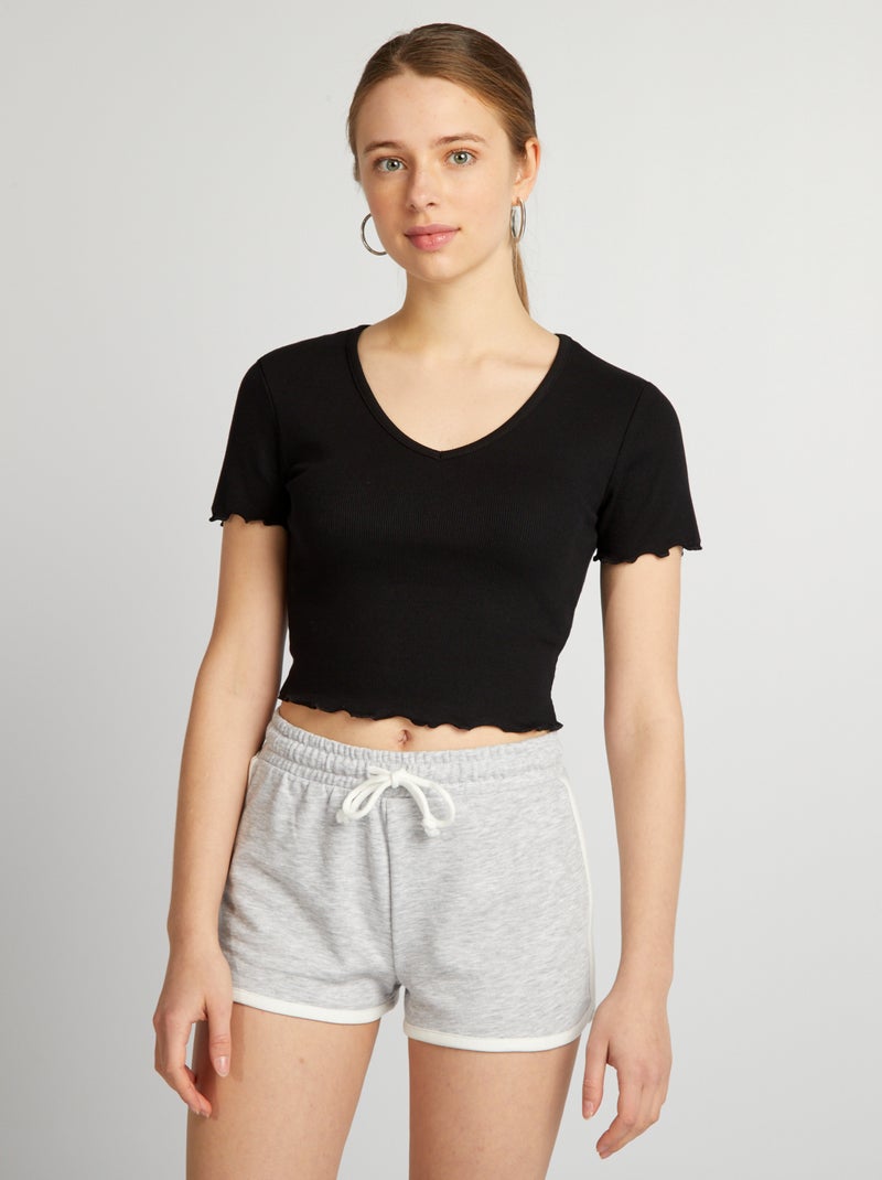 Crop-top con bordes ondulados negro - Kiabi