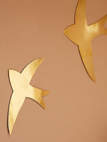 Decoración mural en forma de golondrina de latón