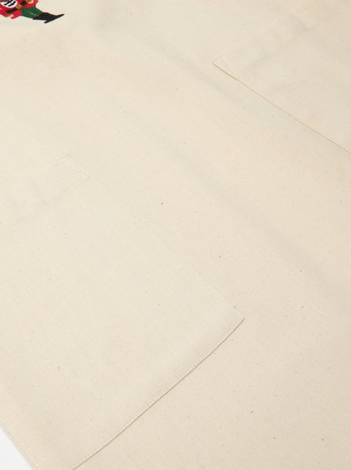 Delantal adulto estampado navideño en algodón 94x69 cm - Kiabi Delantal adulto estampado navideño en algodón 94x69 cm - Kiabi