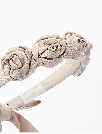 Diadema con flores y tiras