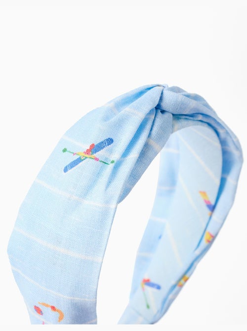 Diadema con nudo Carolina Celas x Zippy - Kiabi