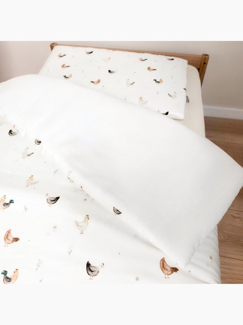 Edredón y almohada infantil reversible de gasa de algodón | SEVIRA KIDS - Kiabi Edredón y almohada infantil reversible de gasa de algodón | SEVIRA KIDS - Kiabi