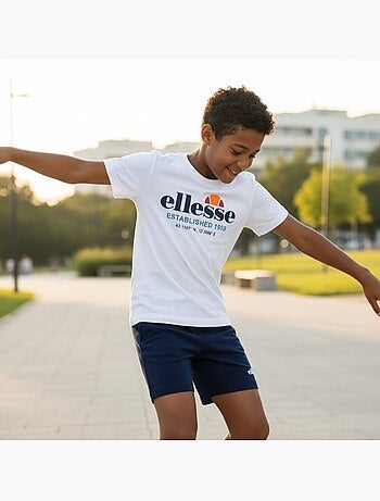Ellesse - Conjunto niño práctico y moderno compuesto por dos camisetas y un pantalón corto