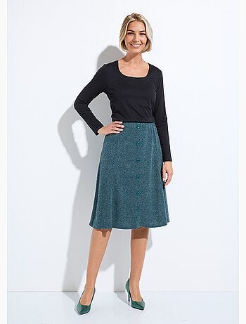 Falda acampanada de largo medio en punto liso y cálido