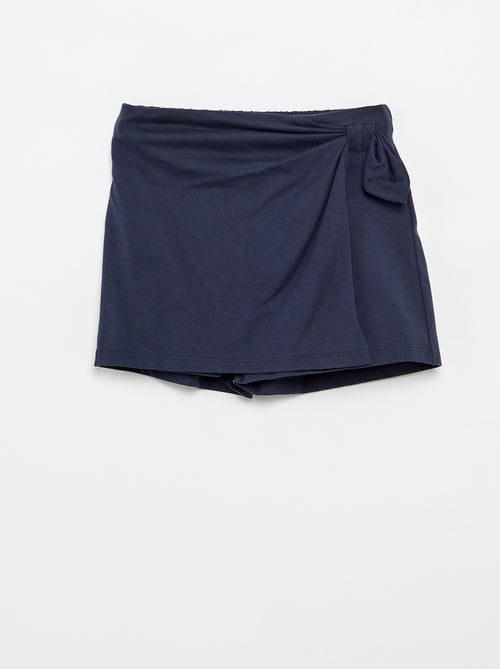 Falda con lazo de fantasía - Kiabi