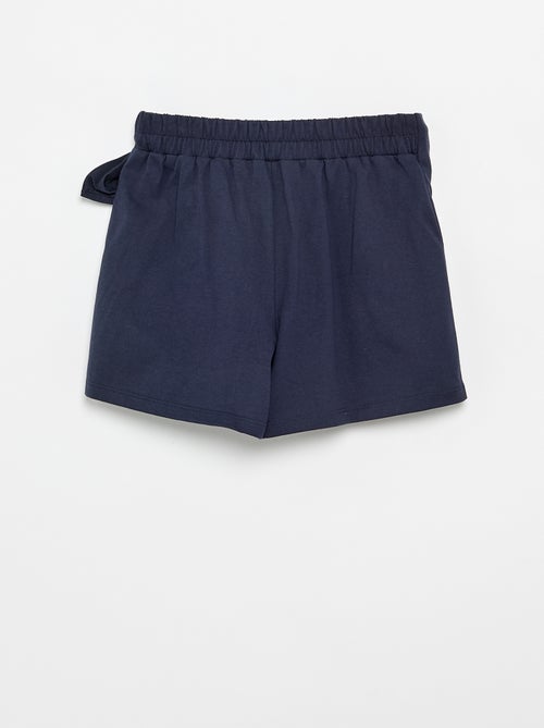 Falda con lazo de fantasía - Kiabi