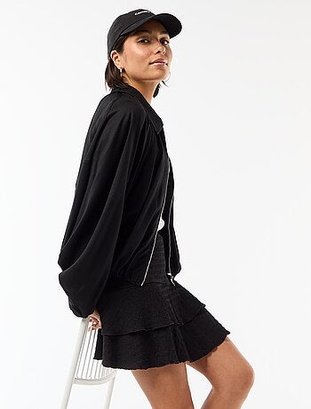 Falda corta con volantes de punto crinkle