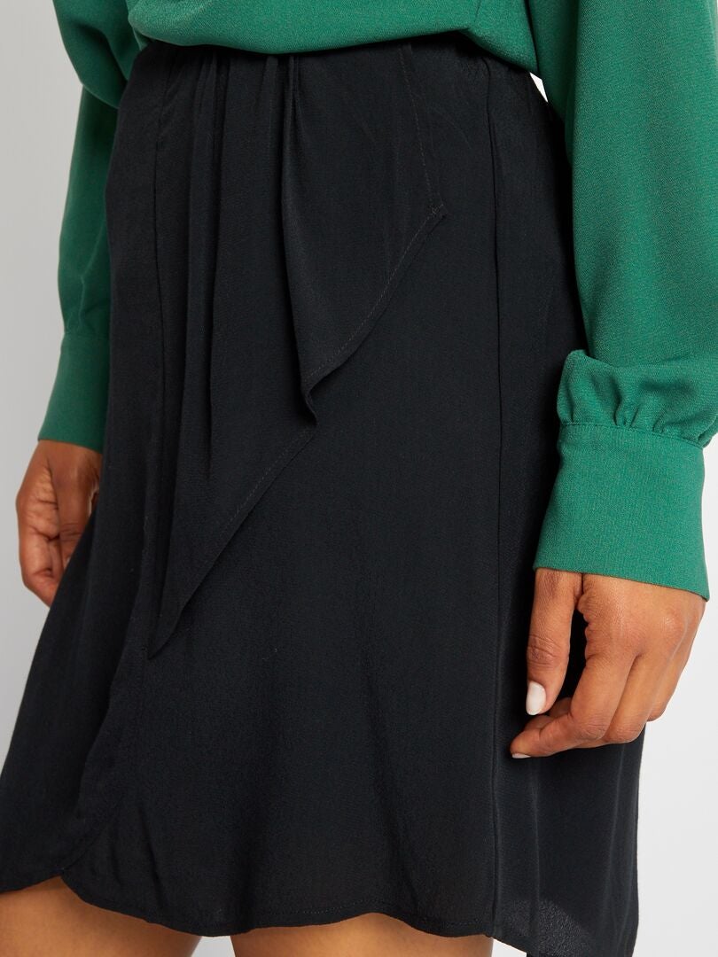 Falda corta de punto de crepé negro - Kiabi