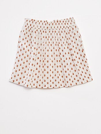 Falda corta de tejido de crepé