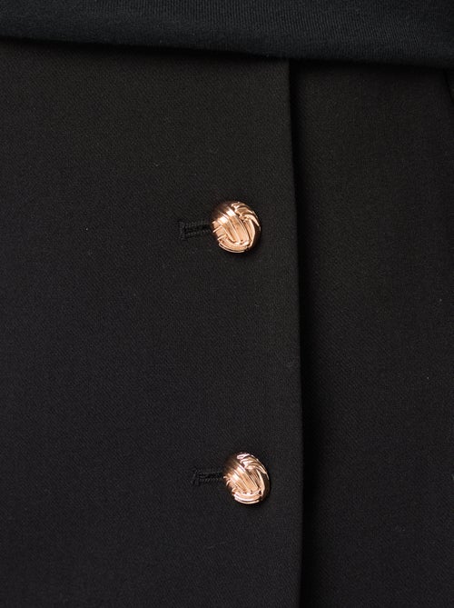 Falda corta en Milano con botones dorados - Kiabi