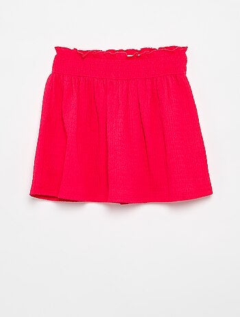 Falda corta estilo patinadora con pantalón corto integrado
