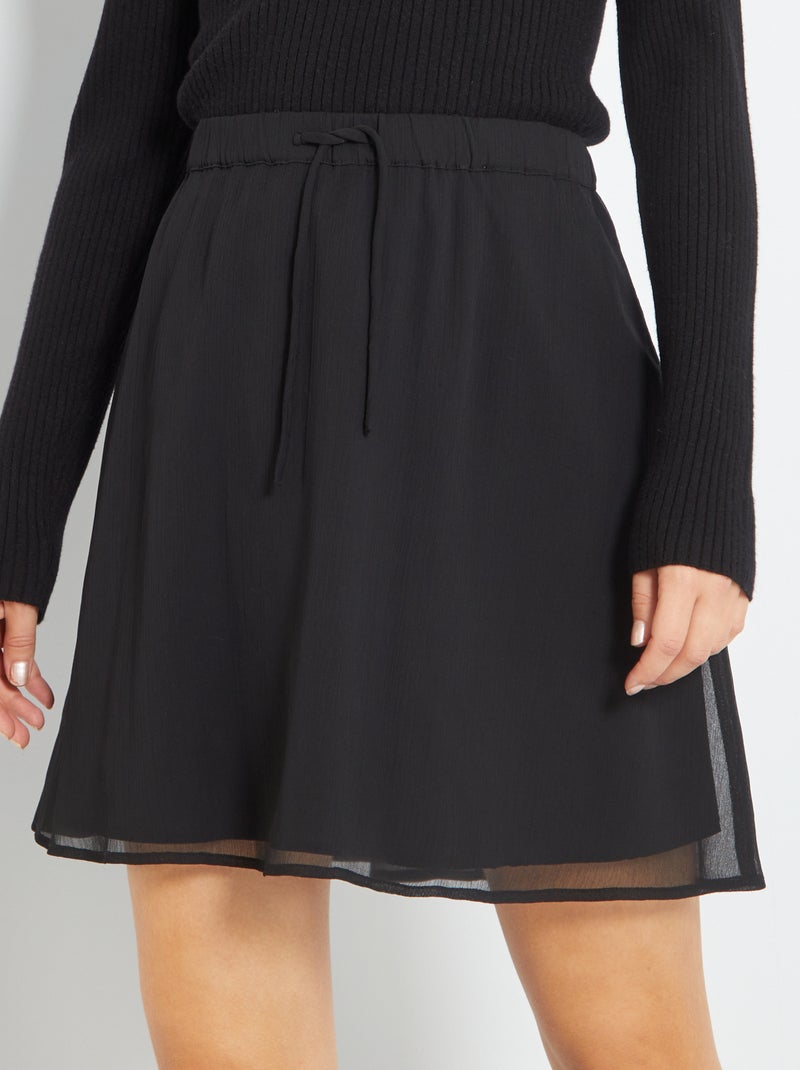 Falda corta lisa y estampada Negro - Kiabi