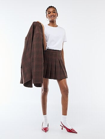 Falda corta plisada con cremallera