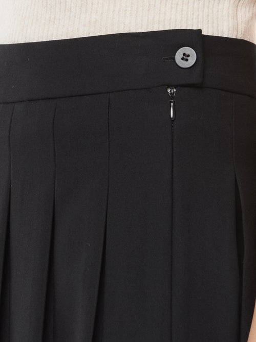 Falda corta plisada - Kiabi