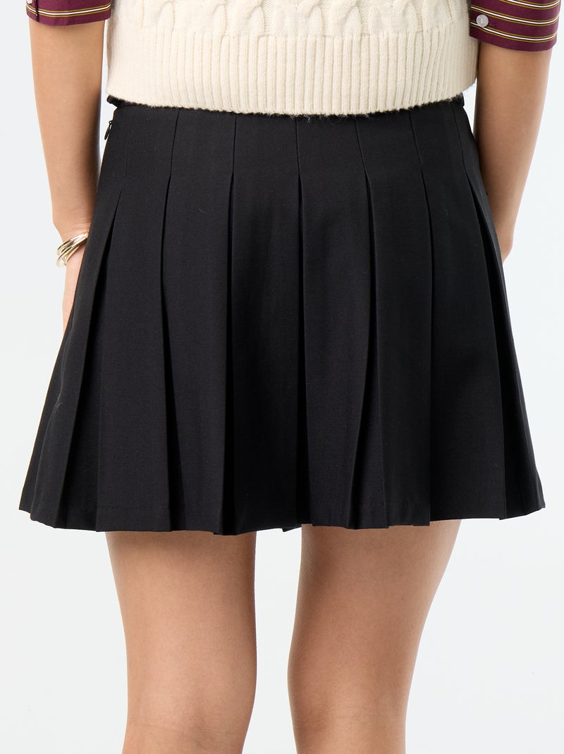 Falda corta plisada Negro - Kiabi