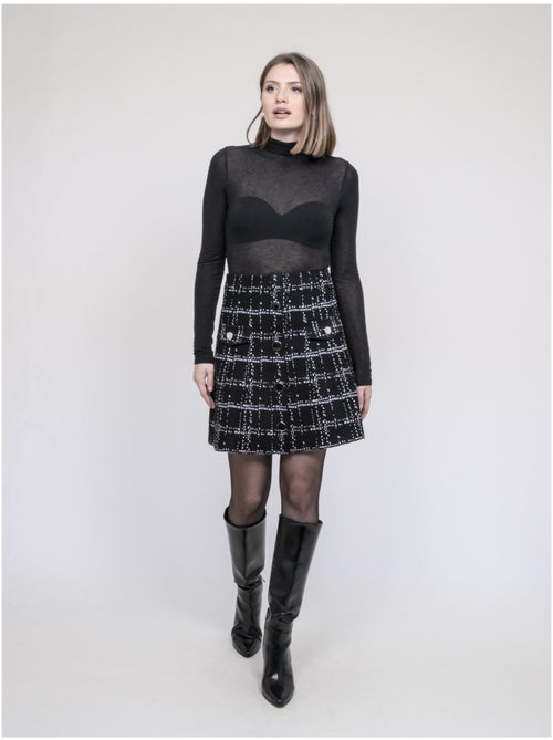Falda de punto con botones delanteros XIVRY - Kiabi Falda de punto con botones delanteros XIVRY - Kiabi