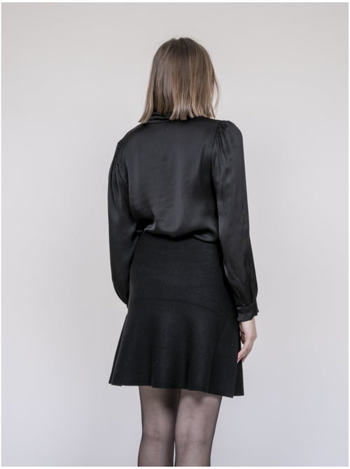 Falda de punto con botones delanteros XIVRY - Kiabi Falda de punto con botones delanteros XIVRY - Kiabi